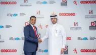 Sabah Rabiah Al Kuwari, Director PR at Ooredoo (right) and Mohammad Imran, General Manager of Dohatna Innovative Distribution and PDTC.