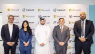 Lana Khalaf, General Manager of Microsoft Qatar, Michael Javier, CEO and Founder of CWallet, and other officials, during the agreement signing ceremony, recently. 