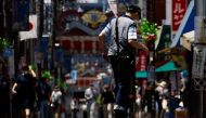 Passersby are seen through a heat haze during hot weather at Sugamo district in Tokyo, Japan June 27, 2022. Reuters/Issei Kato/File Photo