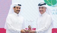 Minister of State for Energy Affairs, President and CEO of QatarEnergy Saad Sherida Al Kaabi presenting the award to Ahmed Rahimi, QAFCO’s Chief Operating Officer.