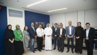 Sheikh Dr. Mohammed bin Hamad Al Thani (center), Director of Public Health Department at Ministry of Public Health, with other official during the program.