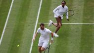 July 1, 2022 Britain's Jamie Murray and Venus Williams of the U.S. in action during their first round mixed doubles match against Australia's Michael Venus and Poland's Alicja Rosolska REUTERS/Matthew Childs