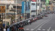 Three-wheelers queue to buy petrol due to fuel shortage, amid the country's economic crisis, in Colombo, Sri Lanka, July 5 2022. REUTERS/Dinuka Liyanawatte