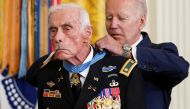 US President Joe Biden awards the Medal of Honor to US Army veteran retired Major John Duffy, who fought in the Vietnam War, during a ceremony in the East Room at the White House in Washington, US, July 5, 2022. (Reuters/Kevin Lamarque)
