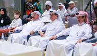 Minister of State and President of Qatar National Library H E Dr. Hamad bin Abdulaziz Al Kawari with other dignitaries during the event.
