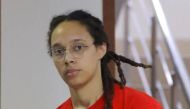 U.S. basketball player Brittney Griner, who was detained in March at Moscow's Sheremetyevo airport and later charged with illegal possession of cannabis, is escorted before a court hearing in Khimki, outside Moscow, Russia July 7, 2022. REUTERS/Evgenia Novozhenina