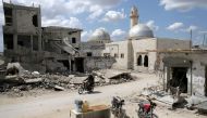 File photo: Damaged buildings in the rebel-held town of Nairab, in northwest Syria’s Idlib region. (Reuters)
