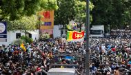 Demonstrators gather outside the office of Sri Lanka's Prime Minister Ranil Wickremesinghe, amid the country's economic crisis, in Colombo, Sri Lanka July 13, 2022. REUTERS/Adnan Abidi