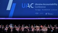 War crimes prosecutors and top European judicial authorities meet to coordinate efforts to investigate and put on trial alleged perpetrators of atrocities since Russia's invasion of Ukraine, at the Ukraine Accountability Conference in The Hague, Netherlands, July 14, 2022. REUTERS/Piroschka van de Wouw