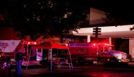 Law enforcement officers stand guard near the crime scene after a shooting at a mall in the Indianapolis suburb of Greenwood, Indiana, U.S. July 17, 2022. REUTERS/Cheney Orr
