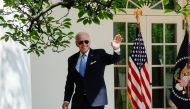 US President Joe Biden waves after delivering remarks to staff in the Rose Garden as he returns from COVID-19 isolation to work in the Oval Office, at the White House in Washington on July 27, 2022. (REUTERS/Jonathan Ernst)