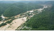 A valley lies flooded as seen from a helicopter during a tour by Kentucky Governor Andy Beshear over eastern Kentucky, U.S. July 29, 2022. Office of Governor Andy Beshear/Handout via REUTERS