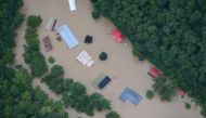 :A flooded area is flown over by a Kentucky National Guard helicopter deployed in response to a declared state of emergency in eastern Kentucky, U.S. July 27, 2022. U.S. Army National Guard/Handout via REUTERS THIS IMAGE HAS BEEN SUPPLIED BY A THIRD PARTY.