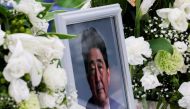 A picture of late former Japanese Prime Minister Shinzo Abe, who was gunned down while campaigning for a parliamentary election, is seen at Headquarters of the Japanese Liberal Democratic Party in Tokyo, Japan July 12, 2022. REUTERS/Kim Kyung-Hoon


