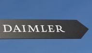 Daimler AG sign is pictured at the IAA truck show in Hanover, Germany, September 22, 2016. REUTERS/Fabian Bimmer/File Photo