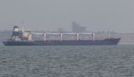 The Sierra Leone-flagged ship Razoni leaves the sea port in Odesa after restarting grain export, amid Russia's attack on Ukraine, on August 1, 2022. (REUTERS/Serhii Smolientsev)
