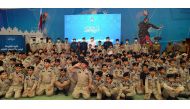 Undersecretary of the Ministry of Interior and the Commander of the Lekhwiya Force H E Major General Abdulaziz bin Faisal Al Thani and officers with the students of the new batch.