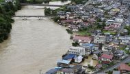 A view shows a submerged residential area caused by a flood of the Mogami river, in Oe town, Yamagata prefecture, Japan August 4, 2022, in this photo taken by Kyodo Mandatory credit Kyodo via REUTERS