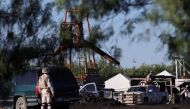 Soldiers keep watch at the facilities of a coal mine that collapsed leaving miners trapped, in Sabinas, in Coahuila state, Mexico, August 3, 2022. REUTERS/Antonio Ojeda 