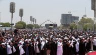 Supporters of Iraqi populist leader Moqtada al-Sadr gather for mass Friday prayer at Grand Festivities Square within the Green Zone, in Baghdad, Iraq, August 5, 2022. (REUTERS/Alaa al-Marjani)