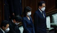 Japan's Prime Minister Fumio Kishida and other lawmakers pay condolences to late former Prime Minister Shinzo Abe, while U.S. House of Representatives Speaker Nancy Pelosi visits the lower house hall of the Parliament, in Tokyo, Japan August 5, 2022. Reuters/Issei Kato