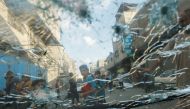 Palestinians, seen through a damaged car window, gather on a street amid Israel-Gaza fighting, in the northern Gaza Strip August 7, 2022. REUTERS/Mohammed Salem