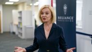Britain's Conservative Party leadership candidate Liz Truss speaks to the media as she visits the Reliance Precision engineering company ahead of a hustings event later, in Huddersfield, Britain August 9, 2022. Ian Forsyth/Pool via REUTERS