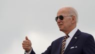 U.S. President Joe Biden gives a thumbs up as he boards Air Force One to depart for Kiawah Island, South Carolina, from Joint Base Andrews in Maryland, U.S., August 10, 2022. REUTERS/Joshua Roberts/File Photo