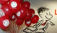 Balloons and a poster of Le Petit Nicolas (Little Nicolas) are seen during the exhibition dedicated to him at Paris City Hall March 5, 2009. Created 50 years ago by writer Rene Goscinny, also the author of Asterix, and Jean-Jacques Sempe, an illustrator who has drawn covers for the New Yorker magazine, Le Petit Nicolas (Little Nicolas) is one of France's best loved characters. REUTERS/Charles Platiau/File Photo