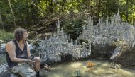 Land art artist Francois Monthoux works on his 