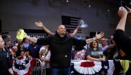 Democratic U.S. Senate candidate John Fetterman poses for a photograph with a supporters during a rally in Erie, Pennsylvania, U.S., August 12, 2022. (REUTERS/Quinn Glabicki)