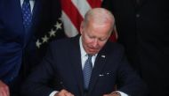 US President Joe Biden signs 