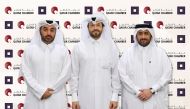  Officials from Qatar Chamber and Qatari Diar Real Estate Investment Company, during the agreement signing ceremony, in Doha, recently. 