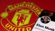 Elon Musk's twitter account and Manchester United logo are seen in this illustration taken, August 17, 2022. Reuters/Dado Ruvic/Illustration