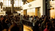 Travellers crowd the security queue in the departures lounge at the start of the Victoria Day holiday long weekend at Toronto Pearson International Airport in Mississauga, Ontario, Canada, May 20, 2022. REUTERS/Cole Burston/File Photo