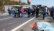 Rescue and emergency responders work at the scene after a bus crash on the highway between Gaziantep and Nizip, Turkey August 20, 2022. Ihlas News Agency via REUTERS