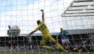 Manchester City's Erling Braut Haaland scores their second goal past Newcastle United's Nick Pope. (REUTERS/Scott Heppell)

