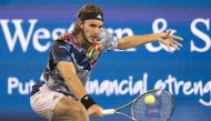 Aug 20, 2022; Cincinnati, OH, USA; Stefanos Tsitsipas (GRE) returns a shot against Daniil Medvedev (RUS) at the Western & Southern Open at the Lindner Family Tennis Center. Mandatory Credit: Susan Mullane-USA TODAY Sports