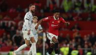 Liverpool's Jordan Henderson in action with Manchester United's Anthony Martial REUTERS/Phil Noble 