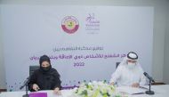 Signing of the MoU between Al Shafallah Centre and Al Rayyan Municipality.