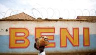 A Congolese boy walks past a wall in Beni, in the Democratic Republic of Congo, April 1, 2019. REUTERS/Baz Ratner/File Photo


