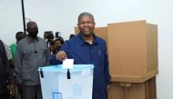 Angola's President and leader of the People's Movement for the Liberation of Angola (MPLA) ruling party Joao Lourenco casts his vote in a general election in the capital Luanda, Angola August 24, 2022. REUTERS/Stringer