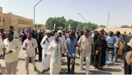 Sudanese demonstrators march and chant during a protest against the military takeover, in Atbara, Sudan, on October 27, 2021.  File Photo / Reuters