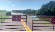View shows closed gates next to a flooded area near Pearl River following water discharges from Barnett Reservoir over the weekend, in Ridgeland, Mississippi, U.S. in this screen grab taken from a video on August 29, 2022. REUTERS TV/via REUTERS