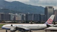 A passenger jet of Taiwan's China Airlines at Taipei Songshan Airport in Taipei, Taiwan, June 8, 2020. (REUTERS/Ann Wang)