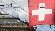 Switzerland's national flag flies in front of the headquarters of Swiss bank Credit Suisse in Zurich, Switzerland, July 27, 2022. (REUTERS/Arnd Wiegman)


