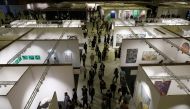 Visitors take a look around at the Frieze art fair, in Seoul, South Korea, September 2, 2022. REUTERS/Kim Hong-Ji