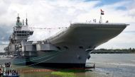 Indian Navy officers stand on the flight deck of India's first home-built aircraft carrier INS Vikrant after its commissioning ceremony at a state-run shipyard in Kochi, India, September 2, 2022. Reuters/Sivaram V