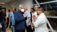 Sri Lanka's ousted President Gotabaya Rajapaksa's party members welcome him and his wife Ioma Rajapaksa at the Bandaranaike International Airport as he returns to the country after he had fled during the July economic unrest and protestors stormed in the president's house in Katunayake, Sri Lanka, on September 2, 2022. PR Media Unit/Handout via Reuters 