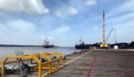 Vessels carrying supplies for an offshore oil platform operated by Exxon Mobil are seen at the Guyana Shore Base Inc wharf on the Demerara River, south of Georgetown, Guyana, January 23, 2020. (REUTERS/Luc Cohen)